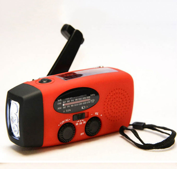 Solar hand crank radio flashlight