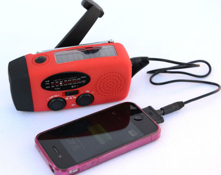 Solar hand crank radio flashlight