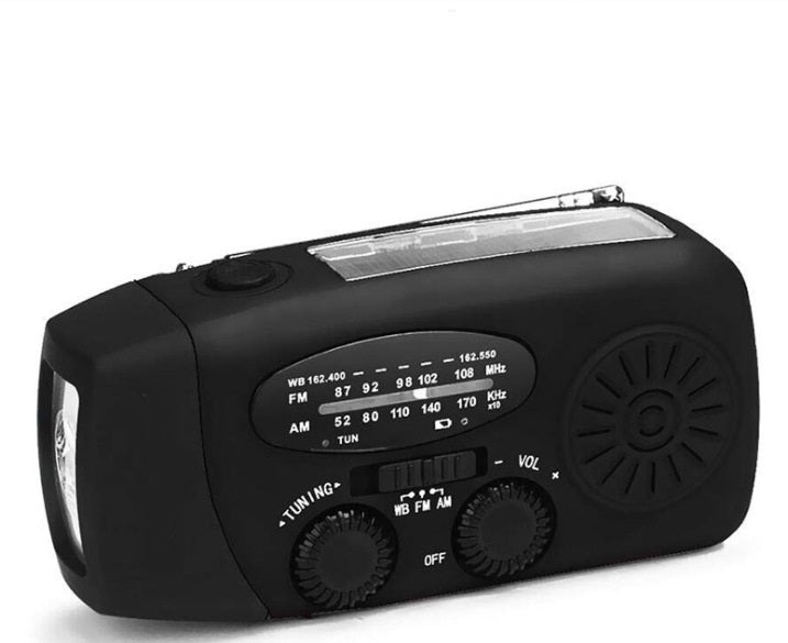 Solar hand crank radio flashlight